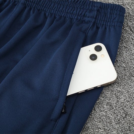 25/26 Arsenal Training Blue Tracksuit - Premium Quality Kits at Football Monarch