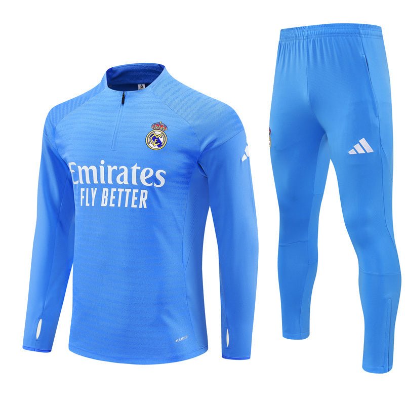 25/26 Real Madrid Training Light Blue Kids Size Tracksuit - Premium Quality Kits at Football Monarch