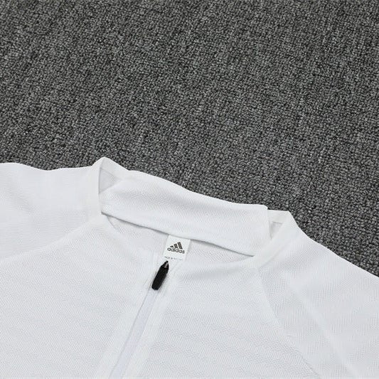 25/26 Real Madrid Training White/Light Blue Kids Size Tracksuit - Premium Quality Kits at Football Monarch