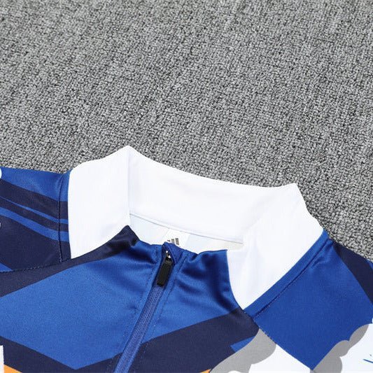 Real Madrid "Azul Reactor" Premium Tracksuit - Premium Quality Kits at Football Monarch