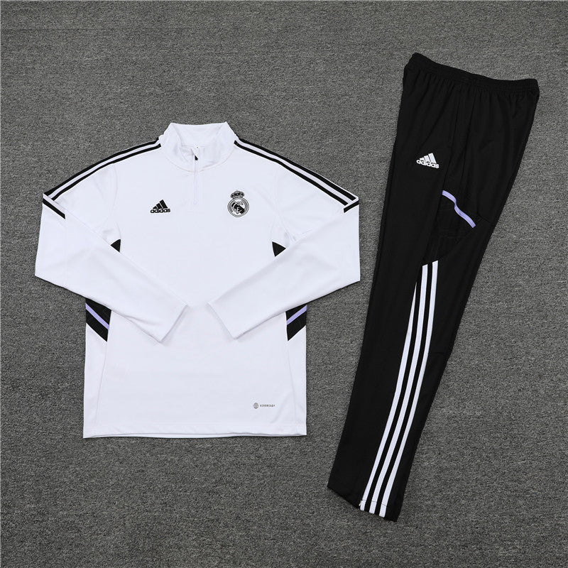 Real Madrid "Momentum" Premium Tracksuit - Premium Quality Kits at Football Monarch