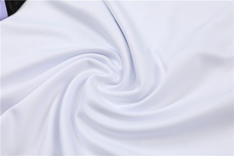 Real Madrid "Momentum" Premium Tracksuit - Premium Quality Kits at Football Monarch