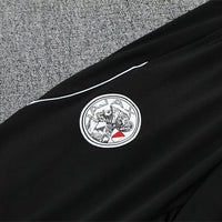 25/26 Ajax Amsterdam Training Black Tracksuit - Premium Quality Kits at Football Monarch