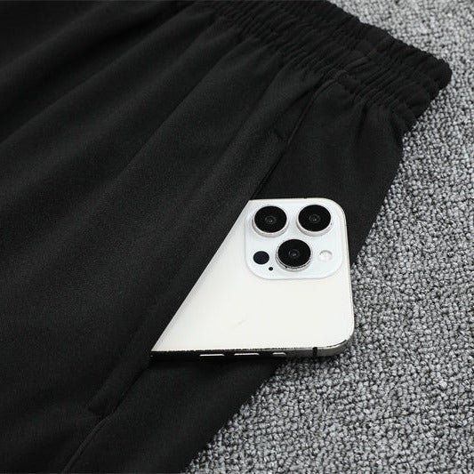 25/26 Manchester United Training Black Tracksuit - Premium Quality Kits at Football Monarch