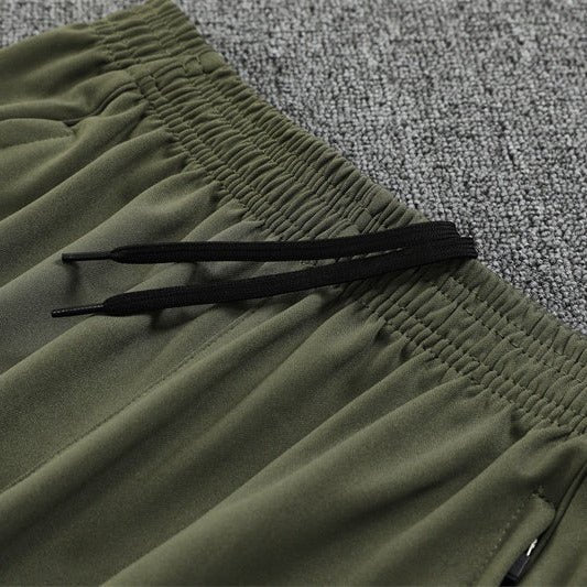 25/26 Real Madrid Training Dark Olive Tracksuit - Premium Quality Kits at Football Monarch