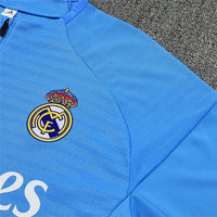 25/26 Real Madrid Training Light Blue Kids Size Tracksuit - Premium Quality Kits at Football Monarch