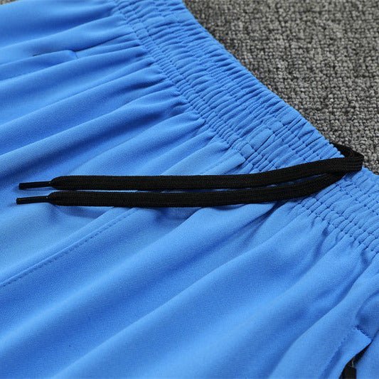 25/26 Real Madrid Training White/Light Blue Tracksuit - Premium Quality Kits at Football Monarch