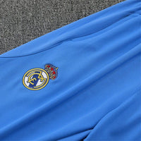 25/26 Real Madrid Training White/Light Blue Tracksuit - Premium Quality Kits at Football Monarch