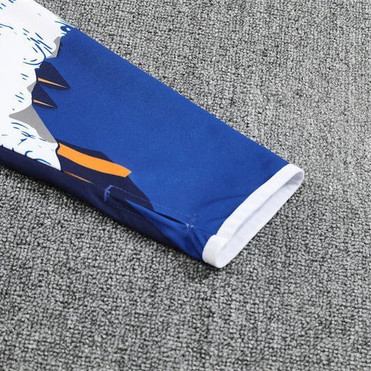 Real Madrid "Azul Reactor" Premium Kids Size Tracksuit - Premium Quality Kits at Football Monarch