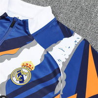 Real Madrid "Azul Reactor" Premium Kids Size Tracksuit - Premium Quality Kits at Football Monarch