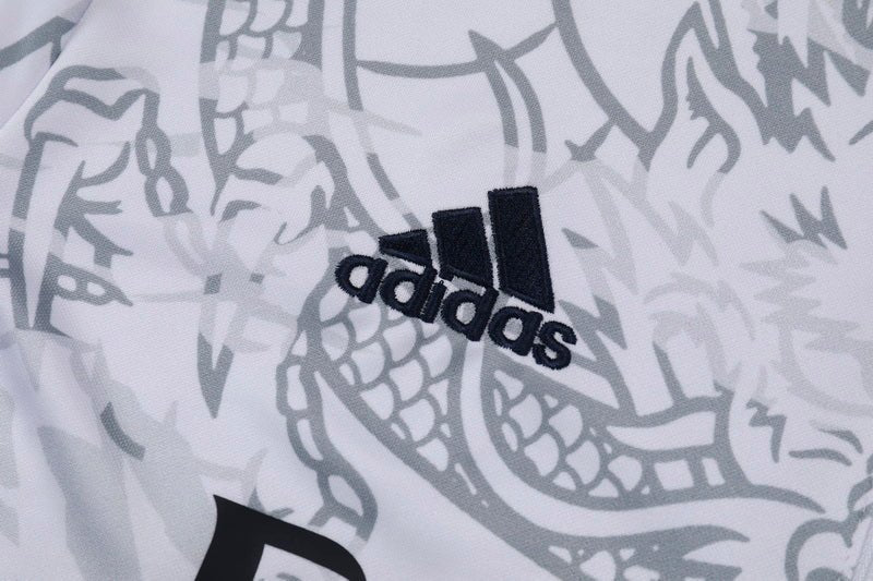 Real Madrid "Dragón Blanco" Premium Tracksuit - Premium Quality Kits at Football Monarch