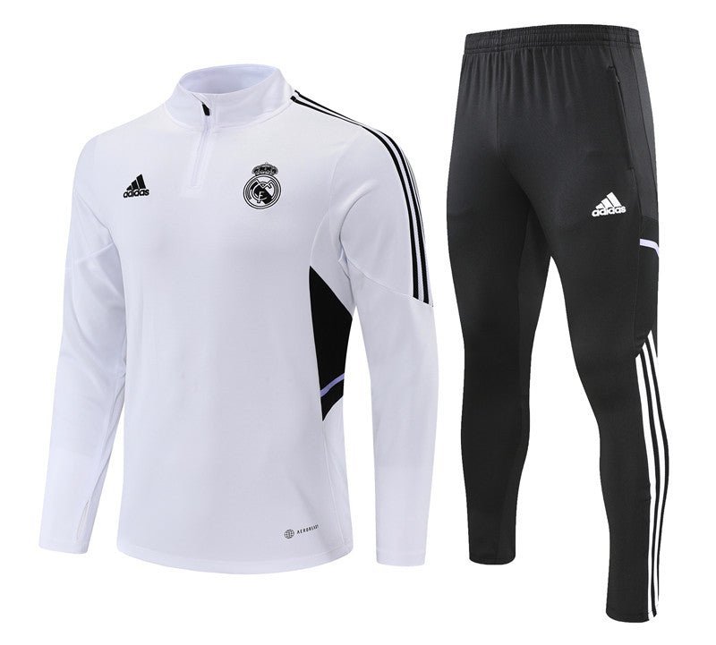 Real Madrid "Momentum" Premium Tracksuit - Premium Quality Kits at Football Monarch