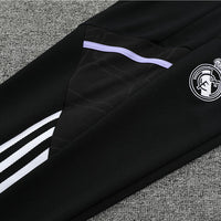 Real Madrid "Momentum" Premium Tracksuit - Premium Quality Kits at Football Monarch