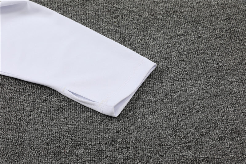 Real Madrid "Momentum" Premium Tracksuit - Premium Quality Kits at Football Monarch